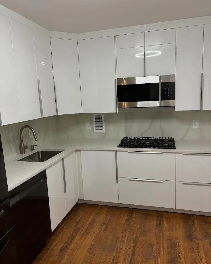 Restored kitchen with white cabinets after water damage in South Houston